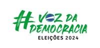 Banner com fundo branco, no qual se lê, em verde bandeira e letras estilizadas, “#Voz da Democra...