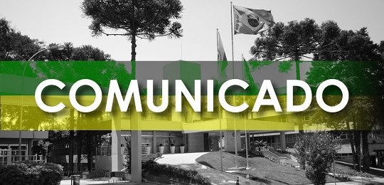 Imagem com "Comunicado" escrito em um fundo preto e branco, e com listras verdes e amarelas